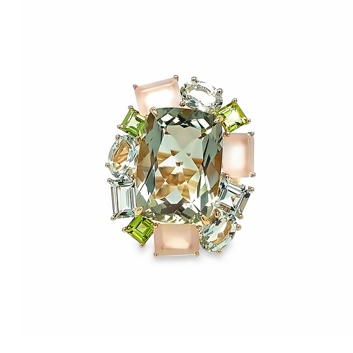 Green and pink geometric ring